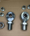 2 pair 1.25 inch Heim Joint Rod End Kit, chromoly rod ends, heat treated, chrome plated with tube adapters and spacers on cardboard.