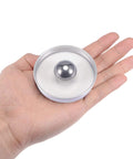 G100 1 Inch 304 Stainless Steel Precision Balls For Keychains And Bearings DIY Projects by uxcell displayed in a hand