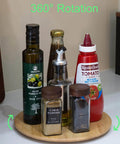 10 inch bamboo wood lazy susan organizer designed for cabinets and countertops with spices and condiments on it.