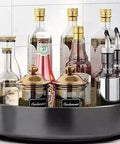 10" Stainless Steel Lazy Susan Turntable Organizer with bottles and jars for spices, oils, and condiments.
