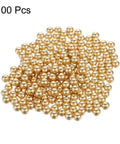 100pcs 6mm Solid Brass Bearing Balls piled for machinery, automotive, and DIY use