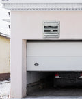10 Inch Shutter Exhaust Fan With 820 CFM High Speed Aluminum Wall Mount Attic Fan installed on garage wall for ventilation