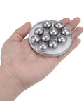 10pcs 20mm Carbon Steel Bearing Balls Precision Polished on a hand, showcasing size and finish