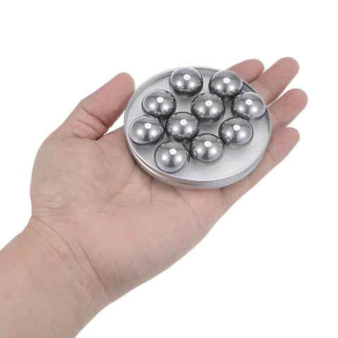 10pcs 20mm Carbon Steel Bearing Balls Precision Polished on a hand, showcasing size and finish