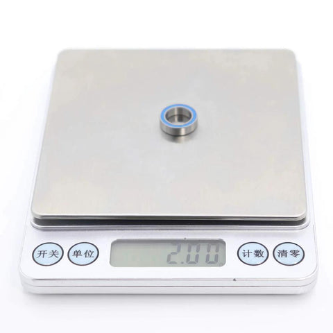 10x15x4mm Ball Bearings Set 6700 2RS Blue Rubber Sealed on digital scale weighing 2.00 grams