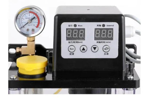Close-up of 110V Auto Lube Pump with digital control, dual displays, and pressure gauge for CNC machines and industrial lube systems