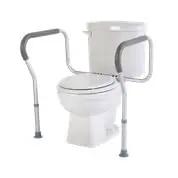 Solid Adjustable Toilet Safety Frame With Cushioned Padded Arms For Safe Stand Up Aid And Zero Sweat Installation Plus Heavy Duty 300 Lb Support That Gives You Peace Of Mind Day And Night near a toilet.