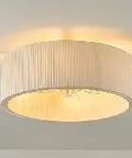 Padxpouo Boho Caged Fandelier Ceiling Fans with Lights and Remote Control featuring a beige fabric shade with pleats.