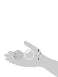 Front view of hand holding Bialetti Moka Express replacement filter and white gasket set (6-cup)