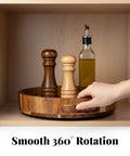 12 inch acacia wood lazy susan wooden turntable organizer with spices in a cabinet, showcasing smooth rotation.