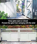 12 Inch Heavy Duty Cane Bolt Gate Drop Rod Ground Latch securing white wooden fence and gate, preventing swinging.