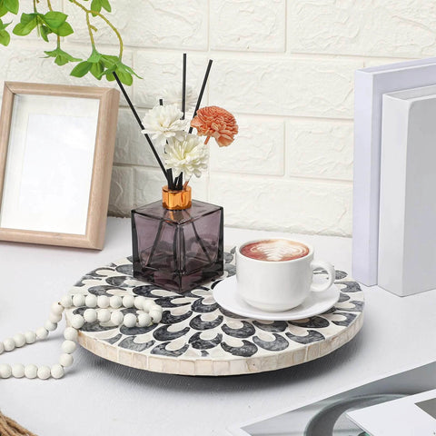 12 inch mother of pearl lazy susan turntable with floral pattern, decorative wooden rotating tray on a table with coffee and flowers.