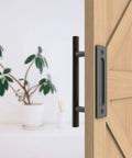 12-Inch Sliding Barn Door Handle Pull And Flush Hardware Set For Interior And Exterior Doors, Rustic Black Round Finish, shown on door
