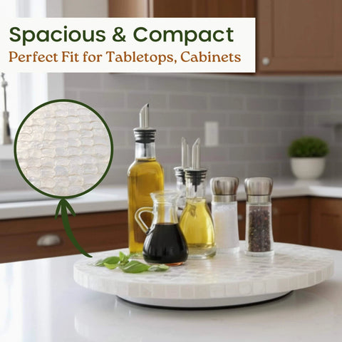 12 inch white capiz lazy susan turntable centerpiece in a kitchen, featuring condiments and oils on a compact tray.