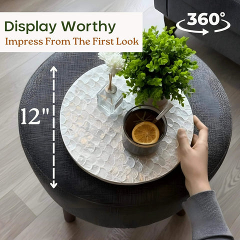 12 inch white capiz lazy susan turntable centerpiece on a table with drinks and a plant, showcasing its decorative use.