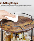 Person wiping 12 Inch Wood Lazy Susan Two Tier Rotating Spice Rack Turntable Organizer For Kitchen Countertop And Cabinet Rustic Brown