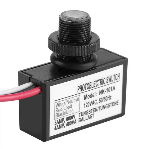Close-up of 120V Outdoor Photoelectric Switch With Light Sensor, hard wired, showing wiring and specifications label.