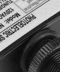Close-up of 120V Outdoor Photoelectric Switch With Light Sensor, label detail and connection fitting, hard wired, energy-saving smart control.