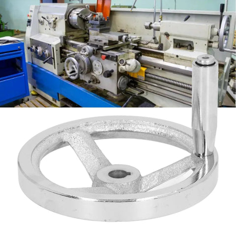 125mm Diameter Rotary Handwheel With 12mm ID Bore Cast Iron Chrome Plated Round Hand Wheel next to a lathe machine
