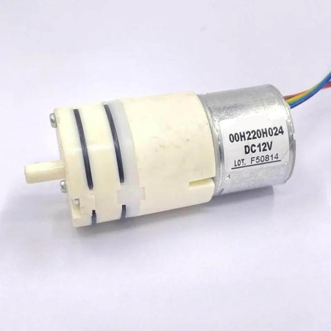Close-up of 12V Brushless Starter Pump For Water Systems With Diaphragm Metering And Self Priming Control showing motor and wiring.