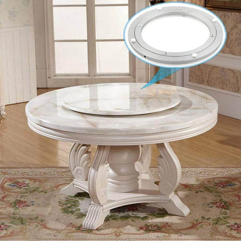 12 Inch Aluminum Heavy Duty Lazy Susan Turntable Bearing on a dining table, highlighting the round swivel plate and smooth rotating base.