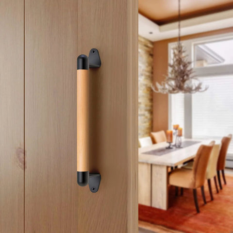 12 Inch Solid Beech Wood Barn Door Handle With Black Metal Brackets Sliding Door Pull For Fence Gate Closet Shed Indoor Handrail And Playground Safety Handles Easy Install Durable And Rust Resistant For Everyday Indoor Or Outdoor Use installed on a wooden door in a dining room.