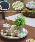 12 Inch Checkered Lazy Susan Handcrafted Capiz Shell Turntable Inlaid On Pine Wood With Pistachio Green Checker Pattern on table