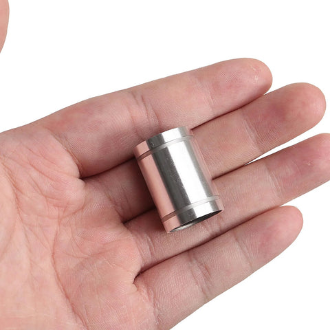 Close-up of 12mm bore linear bearing with double seals for dust resistance, emphasizing smooth, low-friction motion for precise CNC guidance.