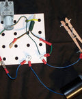 12V 25RPM High Torque DC Motor, Mini JGY 370 Motor Worm Gear with wiring on a white pegboard setup