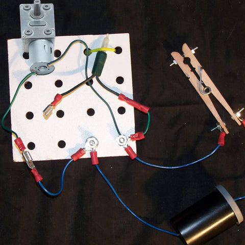 12V 25RPM High Torque DC Motor, Mini JGY 370 Motor Worm Gear with wiring on a white pegboard setup