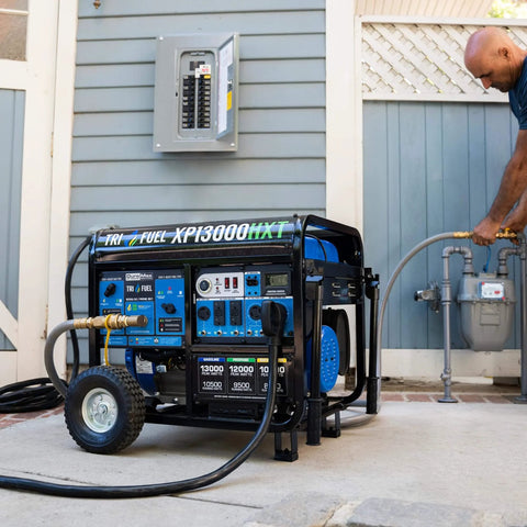 Tri Fuel 13,000 Watt Portable Generator Gas Propane Natural Gas With CO Alert For Home Backup installed outside home
