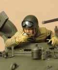 Realistic 1 To 35 US Medium Tank M4A3E8 Sherman Scale Plastic Model Kit With Slide Molded Turret And Welded Hull Texture By Tamiya showing a detailed commander figure in hatch.