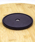 Close-up view of the base of a 14 inch bamboo lazy susan organizer designed for cabinets and pantries, round bamboo turntable.