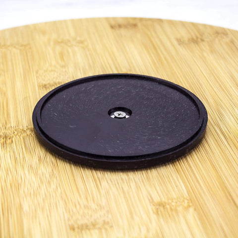 Close-up view of the base of a 14 inch bamboo lazy susan organizer designed for cabinets and pantries, round bamboo turntable.