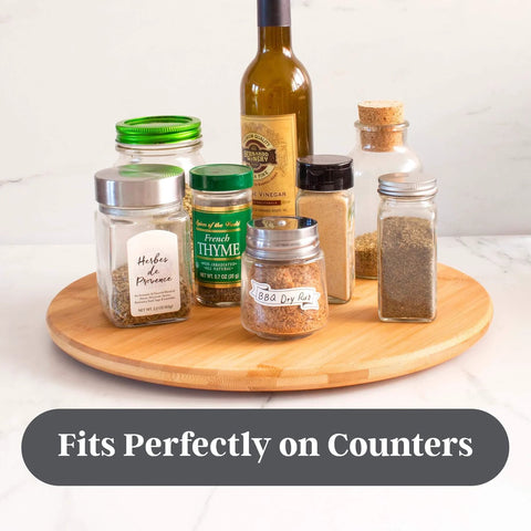 14 inch bamboo lazy susan organizer designed for cabinets and pantries, round bamboo turntable for kitchen counters and spice storage with jars.