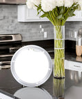 Fourteen Inch Lazy Susan Base Only With Rotating Turntable Bearing for glass, granite, wood tables, heavy-duty aluminum shown in kitchen.