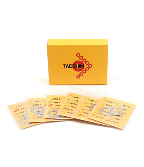 14 Pack Half Inch 28 TPI Barrel Shim Kit for .223 and 5.56 Muzzle Brakes, Precision Stainless Steel 304 shown in packaging with labeled shims