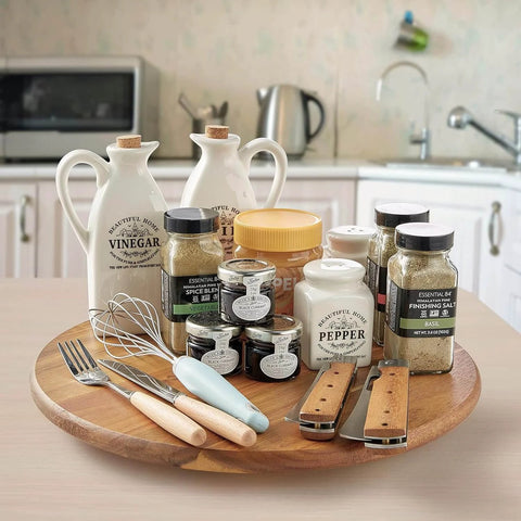 16 inch acacia wood lazy susan cabinet organizer with spices and utensils in kitchen setting.