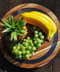 16 inch large lazy susan turntable made from acacia wood and resin, rotating serving tray with fruit display.