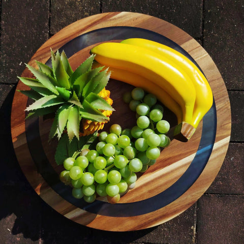 16 inch large lazy susan turntable made from acacia wood and resin, rotating serving tray with fruit display.