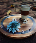 16 inch large lazy susan turntable made from acacia wood and resin, rotating serving tray with flowers and a cup.