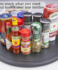 16 Inch Lazy Susan Turntable Heavy Duty Rotating Swivel Stand with Steel Ball Bearings holding various spice bottles