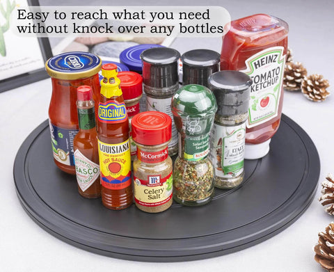 16 Inch Lazy Susan Turntable Heavy Duty Rotating Swivel Stand with Steel Ball Bearings holding various spice bottles