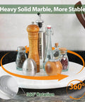 16 inch marble lazy susan turntable organizer made from natural stone, rotating tray with spices and kitchen items.