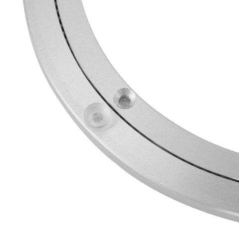 Close-up of 16 Inch Aluminum Heavy Duty Lazy Susan Turntable Bearing with smooth motion and non-slip rubber feet for dining tables and workbenches.
