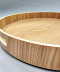 Close-up of a 16 Inch Lazy Susan Turntable With Handles Wooden Rotating Tray With Raised Rim for Rustic Farmhouse Kitchen Island.