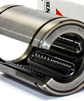 Side view of SMS16GUU-OP 16mm Open Slide Bush Ball Miniature Linear Motion Bearing with packaging, designed for smooth motion, 1-pack.