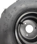 Close-up of 16×8-7 left tire with rim for 50-125cc ATV Go-Kart, showing tread and bolt holes.