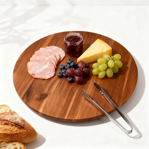 18 Inch Acacia Wood Turntable Organizer Lazy Susan with snacks and tongs on a kitchen table