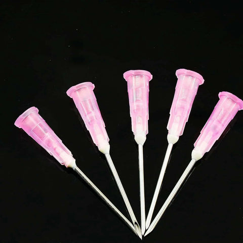 Five 18 Gauge 1 Inch Sterile Disposable Injection Needles With Cap, suitable for Scientific Research and Industrial Dispensing, on black background.